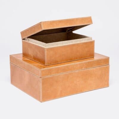 Large rectangular leather box with a distressed, aged camel coloring, showcasing its natural grain and imperfections.
