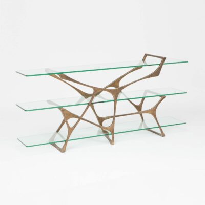 Elegant small console table with three shelves, featuring glass fronts and an iron-aged brass frame.