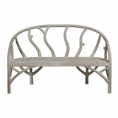 Decorative Faux Bois Arbor Bench showcasing a naturalistic stone finish that varies from grey to brownish and greenish featuring intricate wrought iron