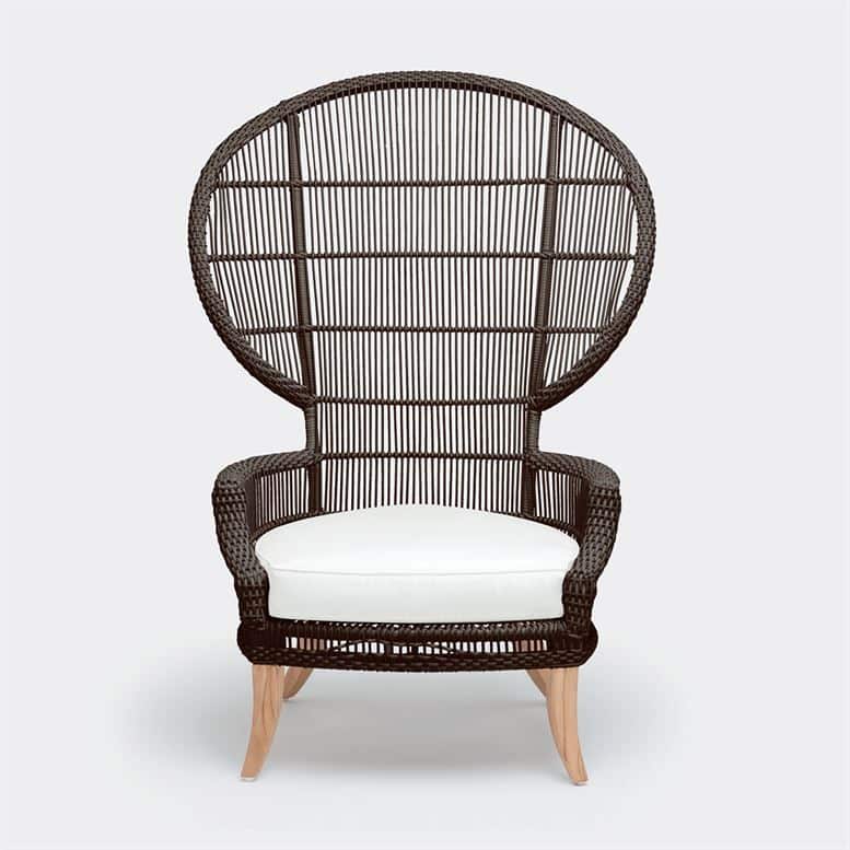 The Elizabethan Outdoor Chair is a stylish piece of furniture designed for outdoor use It features synthetic rattan material in brown and