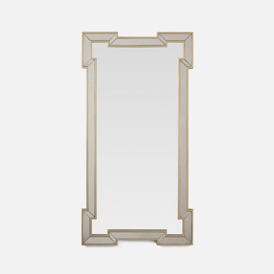 Antique-style mirror with decorative frame, suitable for wall or dresser.