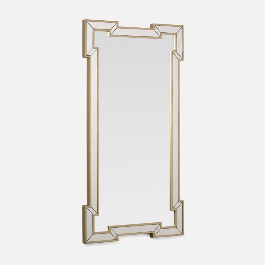 Antiqued mirror with ornate cut panel frame, elegant and timeless design.
