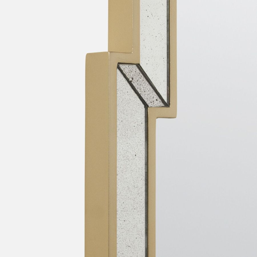 Close-up of Nadine Mirror with cut panel antiqued frame, showcasing its distinctive design.