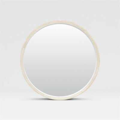 Round mirror with faux shagreen finish in shadowbox style frame, available in various sizes and colors.