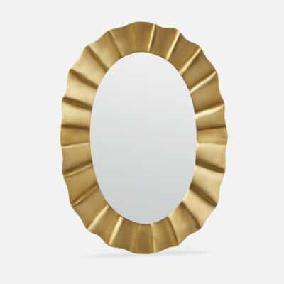 Bright gold oval tin mirror.
