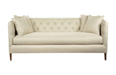 Luxurious Yvette Short Sofa with Rafael Beige upholstery, tufted backrest and exposed wood legs, offering comfortable seating for two.