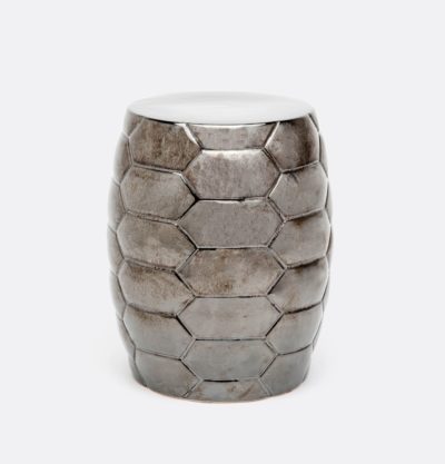 A hexagonal garden stool with a metallic finish, showcasing its unique honeycomb design and black pearl color variation.