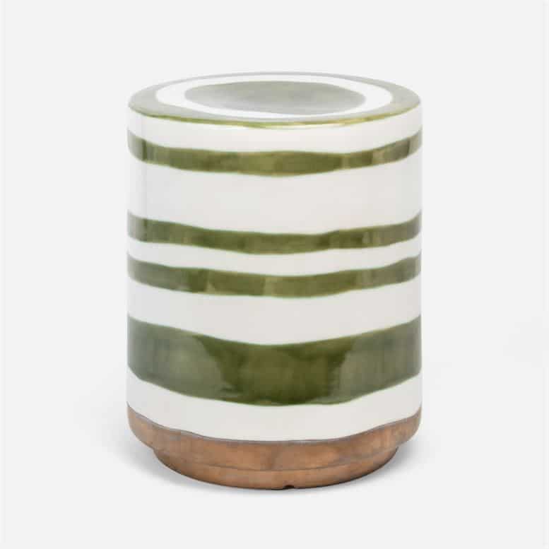Ceramic stool with blue and white stripes.