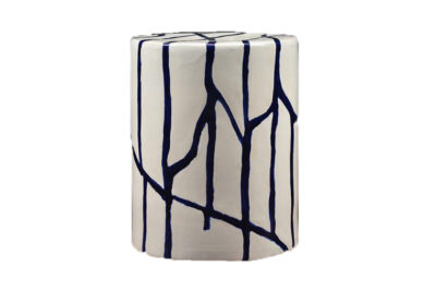 Ceramic stool with blue strokes on a white surface, showcasing its decorative design