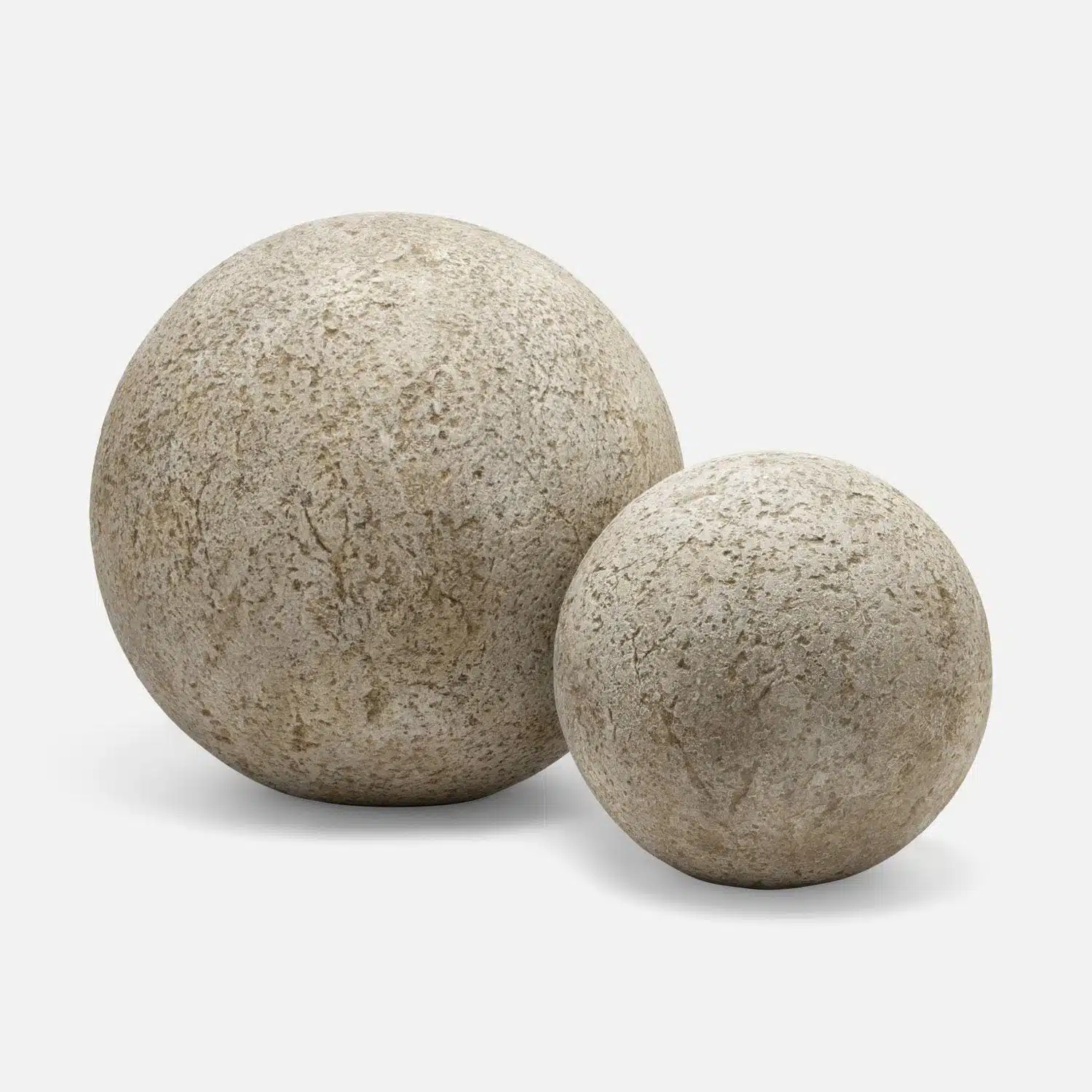 Large concrete balls available in dark gray, distressed light beige gray, and small sizes.