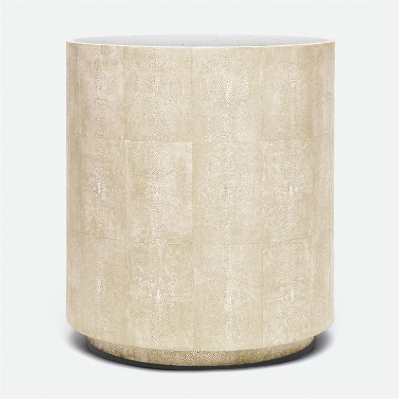 A sleek, modern table with a round top and a glossy finish, standing against a white background.