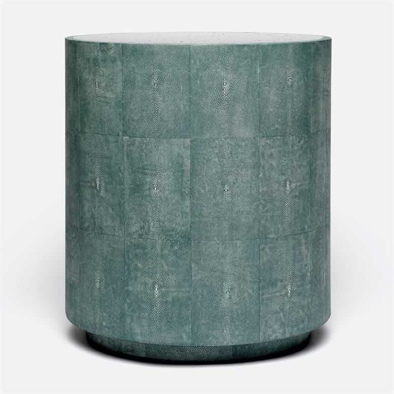 A round, blue faux shagreen side table with a mirrored top.