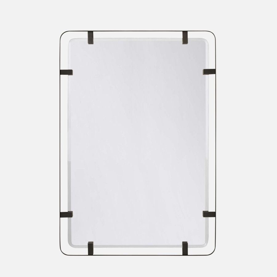 Close-up of a sleek metal clip steel mirror showcasing its modern design and versatility.