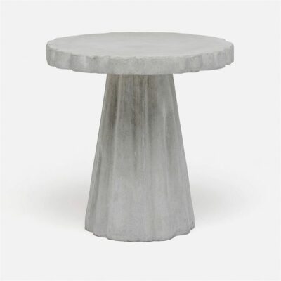 Gray concrete side table with scalloped edges and a smooth top.