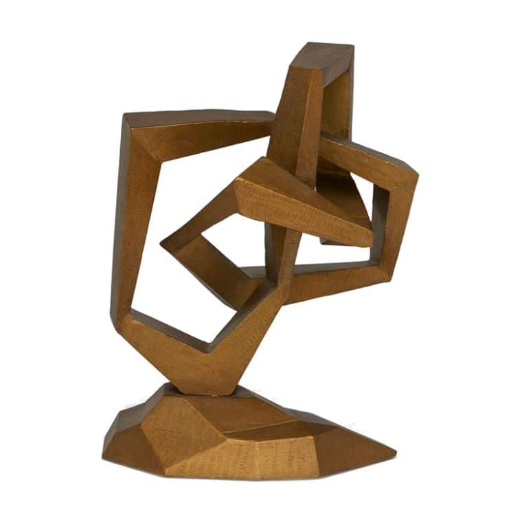 A sculpture with a geometric abstract design, featuring interlocking shapes in a dark brown color, displayed on a white background.