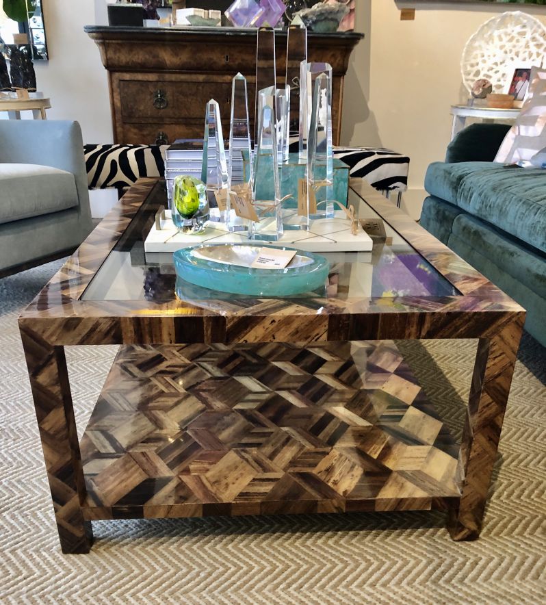 Banana bark coffee table with glass top and geometric banana bark pattern available in dark stain or natural banana bark style This