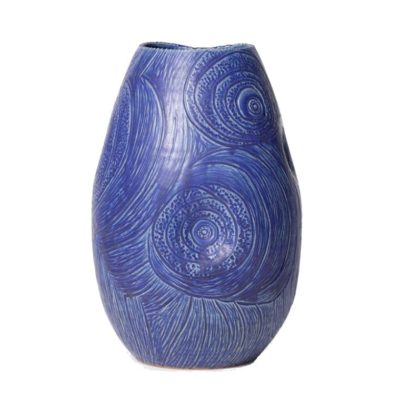 Blue vase with intricate swirling patterns on its surface, set against a white background.