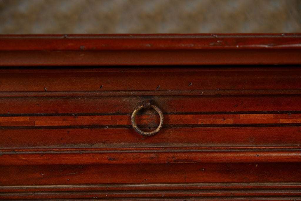 Wooden buffet with two removable interior shelves per door and two slim upper drawers with small ring pulls.