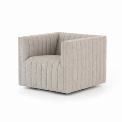 A modern channel swivel chair with a subtle herringbone pattern armrest upholstered in a natural hued fabric The chair features an adjustable