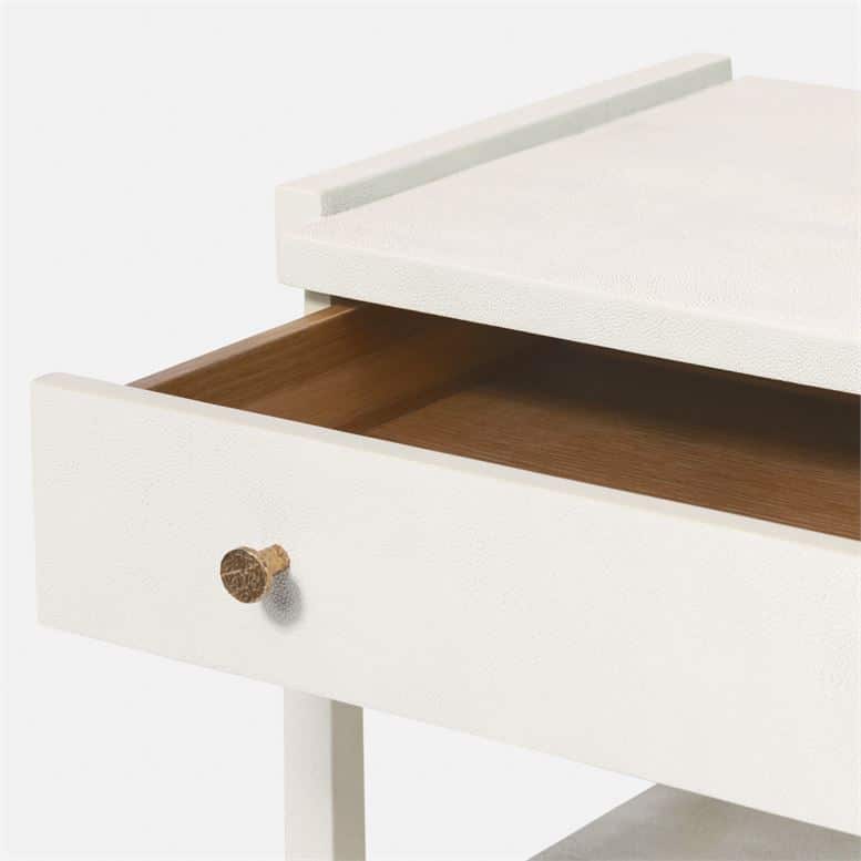 A white nightstand with a wooden drawer and a metal handle, showcasing its design and color options.