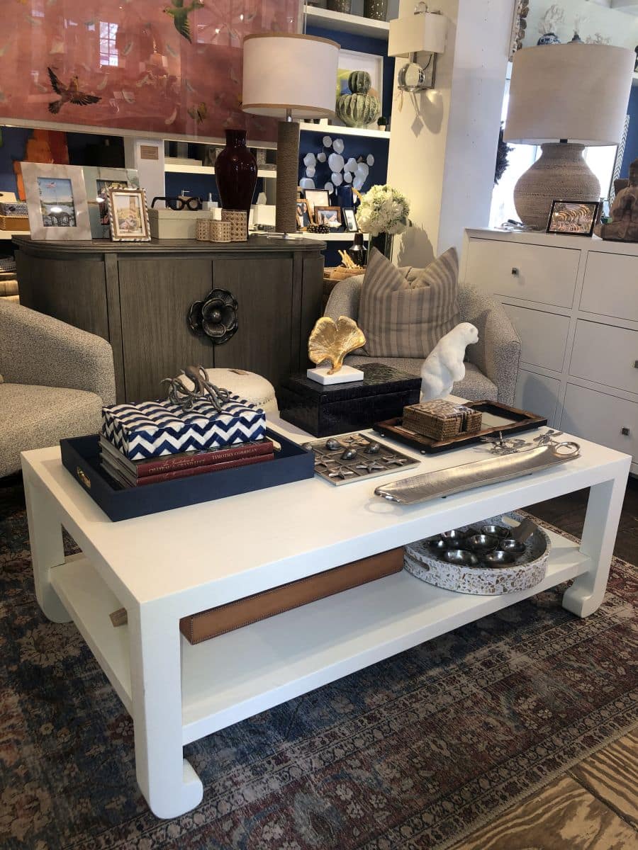 This image showcases an elegant Ming Style Faux Raffia coffee table which is available in French Gray or Seal French Gray finishes