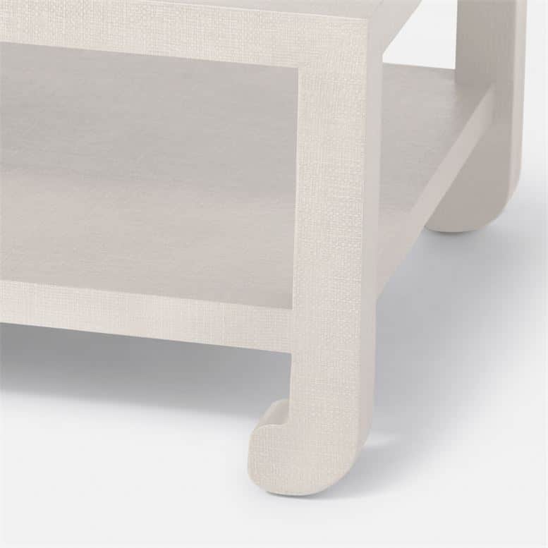 A white coffee table with a beige faux raffia finish available in French Gray and Pristine or Seal French Gray currently in