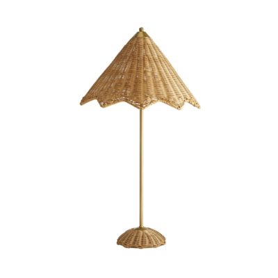 Rattan table lamp with scalloped edge, two bulbs set to dimmer switch, in Hamptons style.