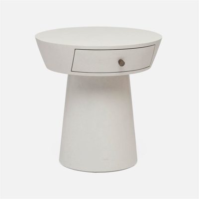 A white mid-century modern style side table with a cylindrical base and a round top, featuring a single drawer on one side.