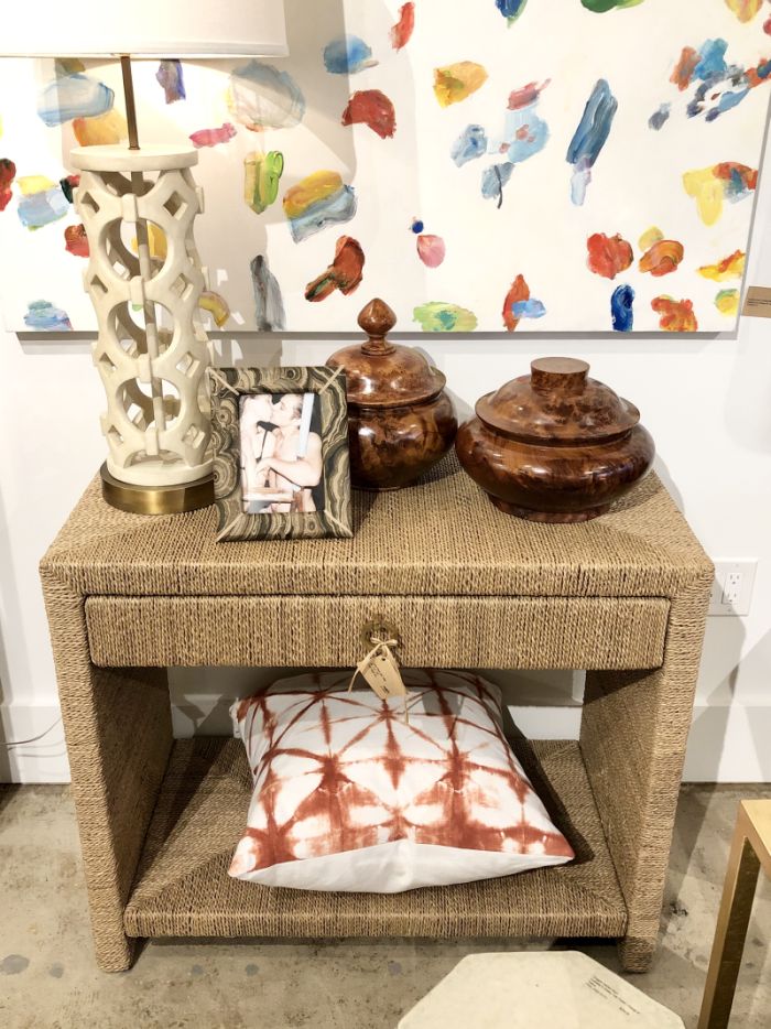 The image displays a stylish tall Tucker Rope Side Table with a drawer in a natural finish It features a mahogany wood