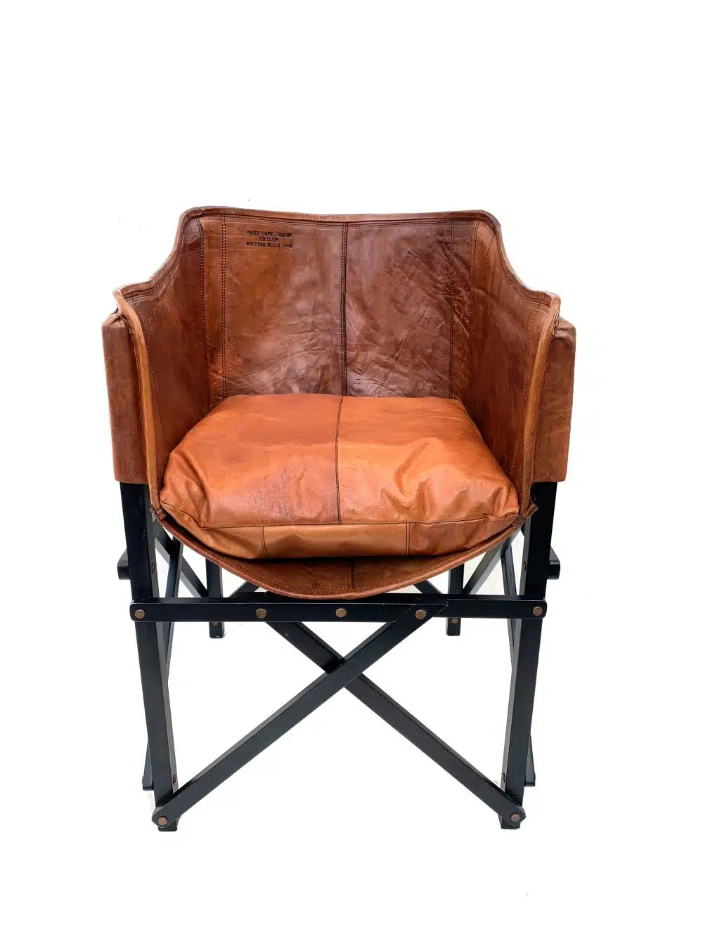 Leather Paris Cafe Chair with teak frame and loose cushion hand tanned showcasing unique leather texture limited stock available special pricing of