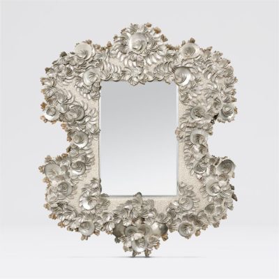 Large ornate wall mirror with intricate designs and patterns made from serpentine abalone shells The silver frame is adorned with decorative elements