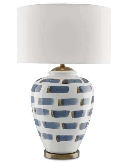 Table lamp with blue and brown striped shade and brass hardware.
