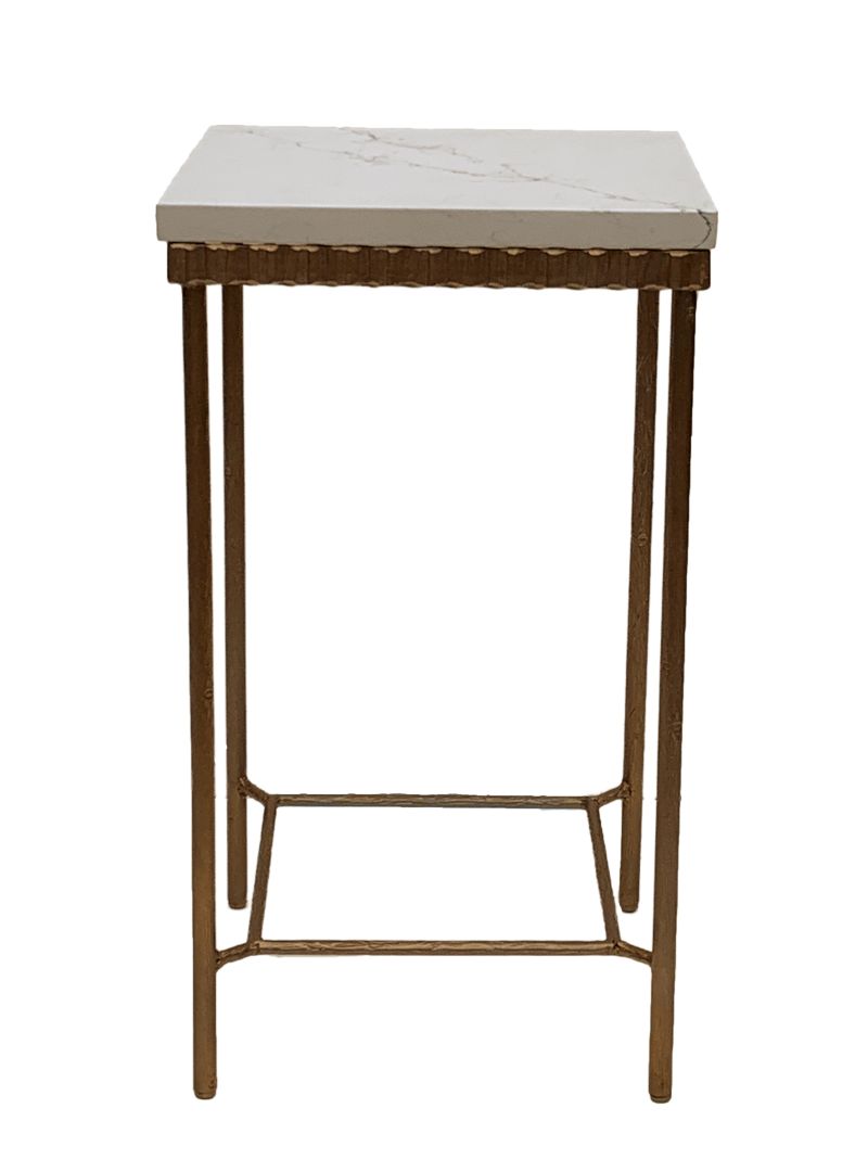 Textured gold and stone side table with a white marble top, standing on four legs against a white background.