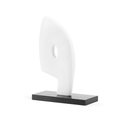 Large white sculpture on black marble base