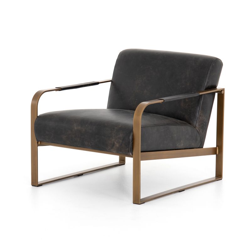 Antique brass framed armchair with black leather upholstery, featuring a high back and armrests, set against a white background.