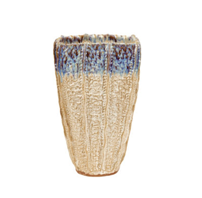 This is an image of a tall, white and purple ceramic vase with a decorative pattern on its surface.