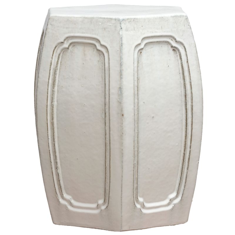 A hexagonal, rustic white garden stool with a unique texture and glaze pitting and small imperfections, presented in a close-up perspective.