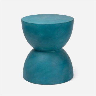 A striking blue concrete stool with a unique round base and cylindrical seat, displayed against a white background.