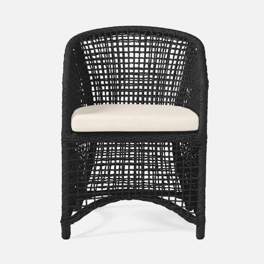 Close-up of an outdoor twisted faux wicker arm chair with white fabric, available in various finishes and additional fabrics.