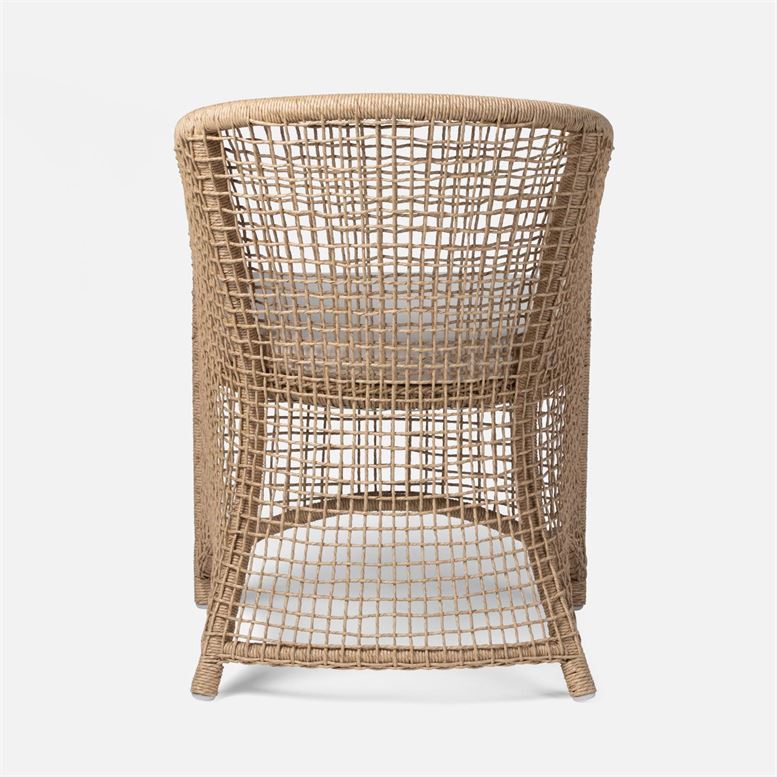 Wicker outdoor armchair with a curved frame and white fabric seat, available in various finishes