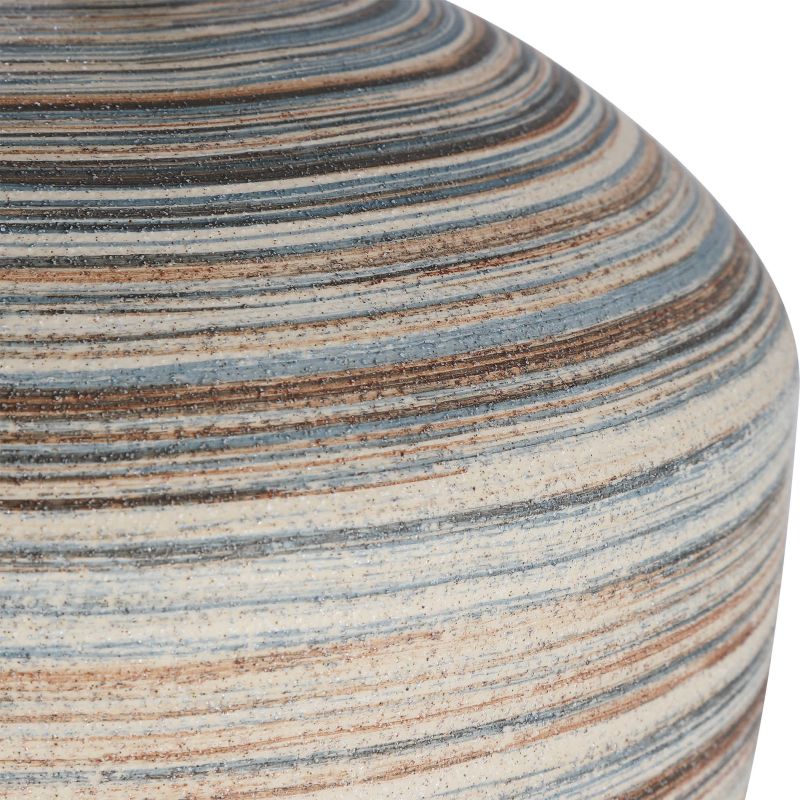 Table lamp with striped finish in brown, blue, cream and taupe linen drum shade with natural slubbing and brass hardware