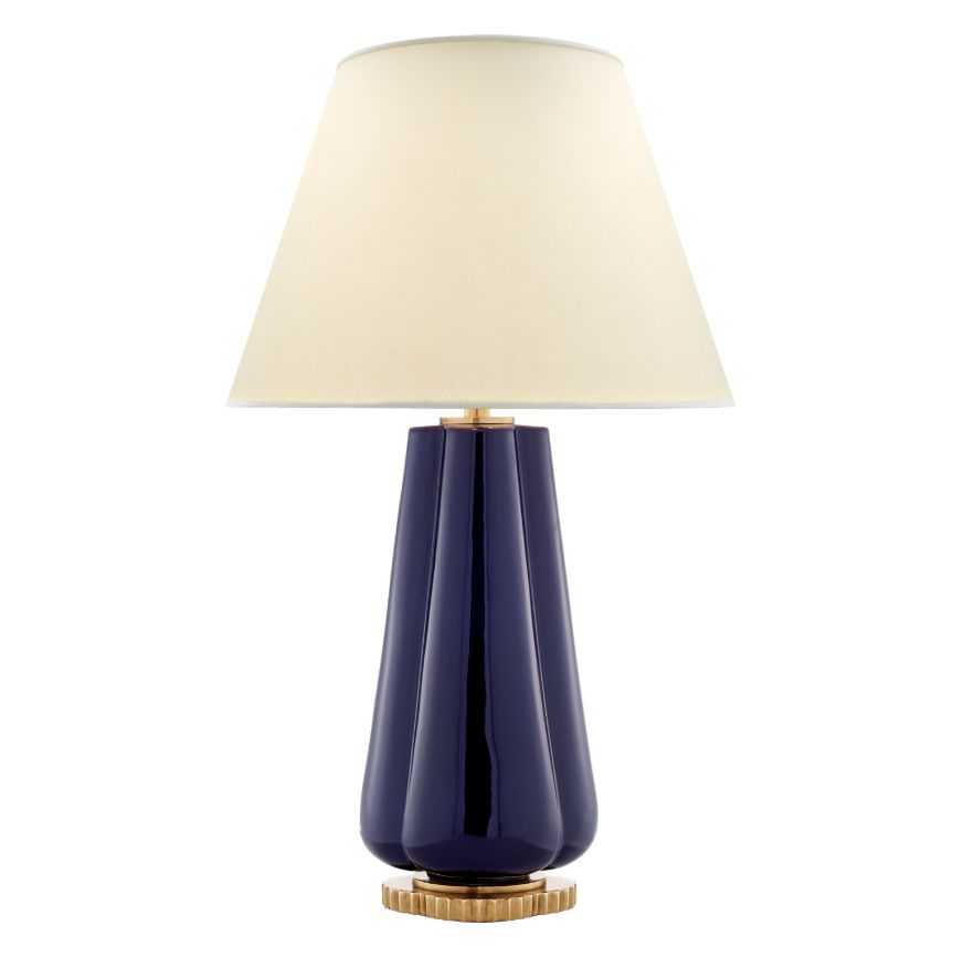 Blue and gold scalloped porcelain table lamp with two bulbs, available in white, berry, green or denim, featuring a linen shade.