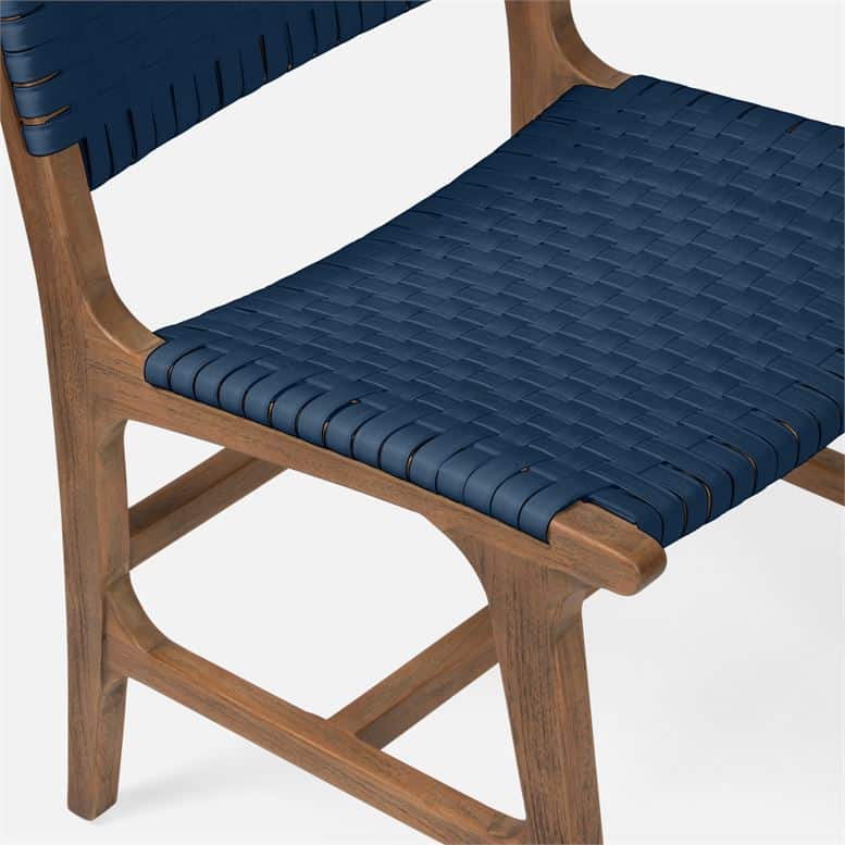 Brown and blue woven chair with a wooden frame, featuring a cushioned seat and a curved backrest.