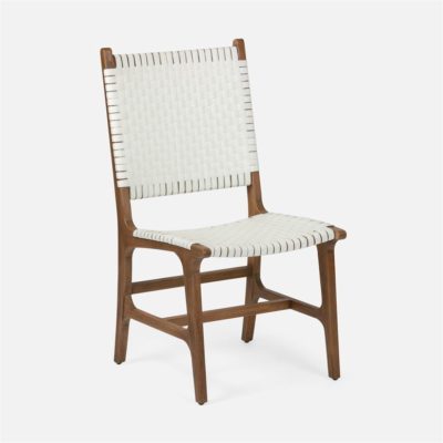 Outdoor side chair with a striped cushion and wooden frame.