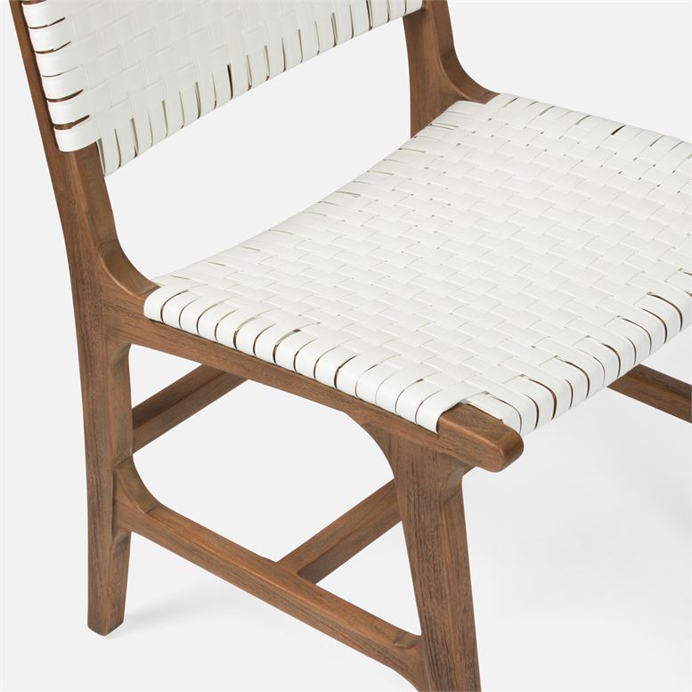 Outdoor Hammond Side Chair with a wicker seat and wooden legs available in flat white or navy blue faux rattan with aged