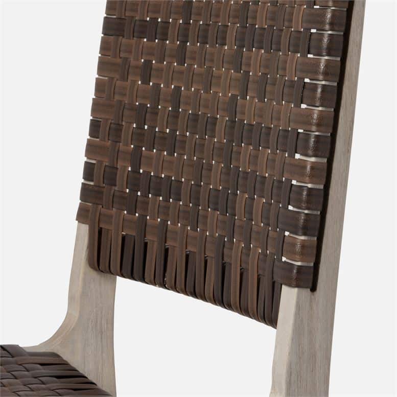 Side view of an outdoor Hammond dining chair in walnut faux rattan with grey teak.