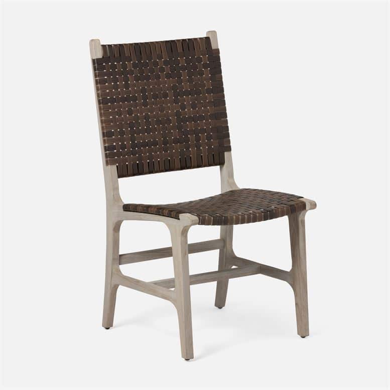 Side view of faux rattan outdoor dining chair in brown, with natural wood legs.
