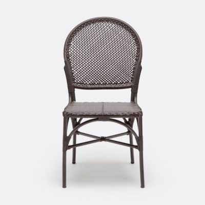 A wicker outdoor side chair in brown or white faux rattan with a round back and slatted seat displayed against a plain