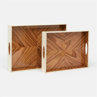 Two wooden trays with a rye and teak finish one larger than the other presented in a minimalist display against a white