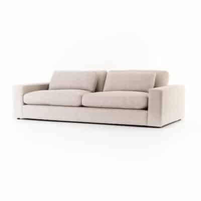 Close-up of Blaine Sofa showcasing plush cushions in natural fabric upholstery, ideal for comfort.